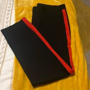 Calvin Klein Black dress/casual pants with red stripe down the seams.